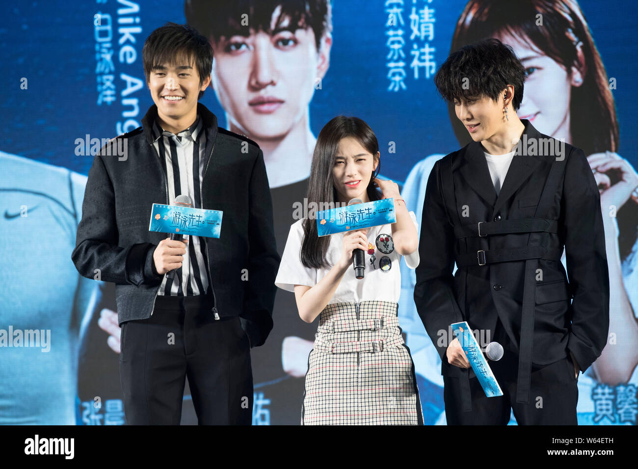 Thai actor and singer Mike D. Angelo of Thai pop duo Golf & Mike, right,  and Chinese singer and actress Ju Jingyi, center, attend a press conference  f Stock Photo - Alamy