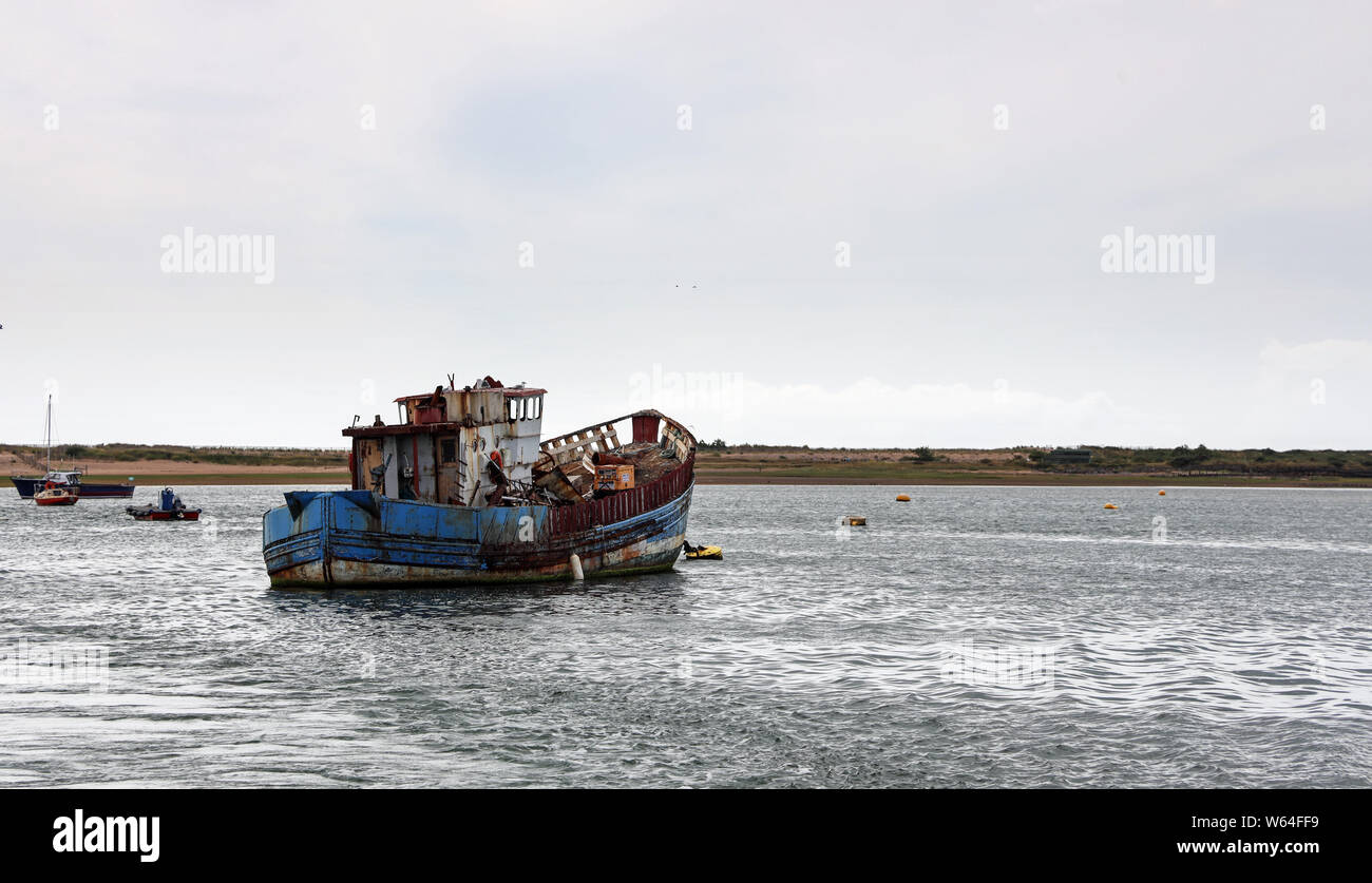 A Wrecked Boat Provides A Resting Place For Gulls On The River Exe In 