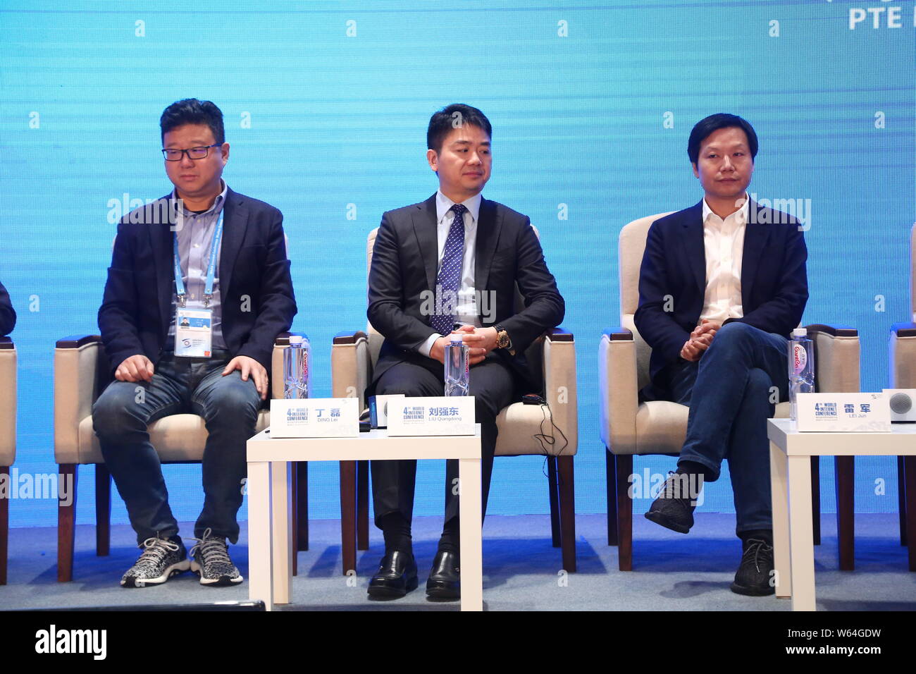 --FILE--(From left) William Ding Lei, CEO of Netease (163.com), Richard Liu Qiangdong, Chairman and CEO of online retailer JD.com, and Lei Jun, Chairm Stock Photo