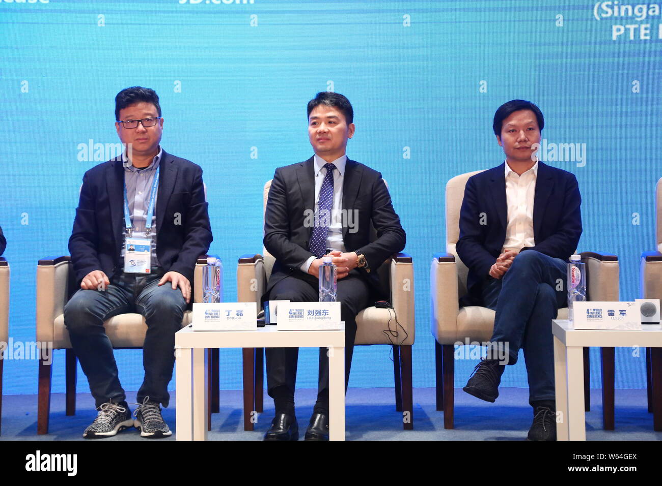--FILE--(From left) William Ding Lei, CEO of Netease (163.com), Richard Liu Qiangdong, Chairman and CEO of online retailer JD.com, and Lei Jun, Chairm Stock Photo
