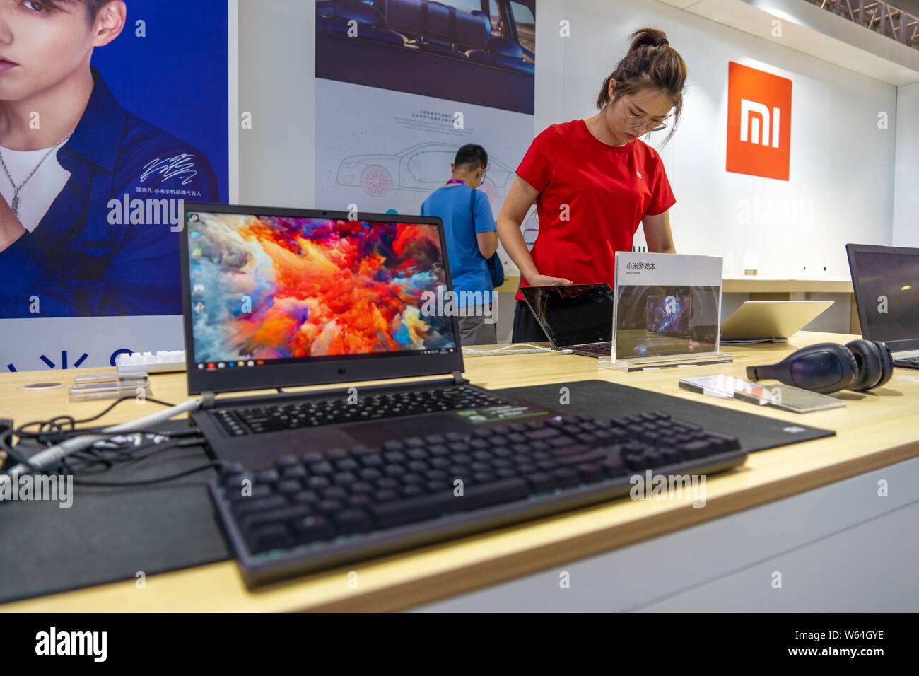 --FILE--Laptop computers are on display at the stand of Xiaomi during the 10th E-Surfing Smart Ecosystem Expo in Guangzhou city, south China's Guangdo Stock Photo