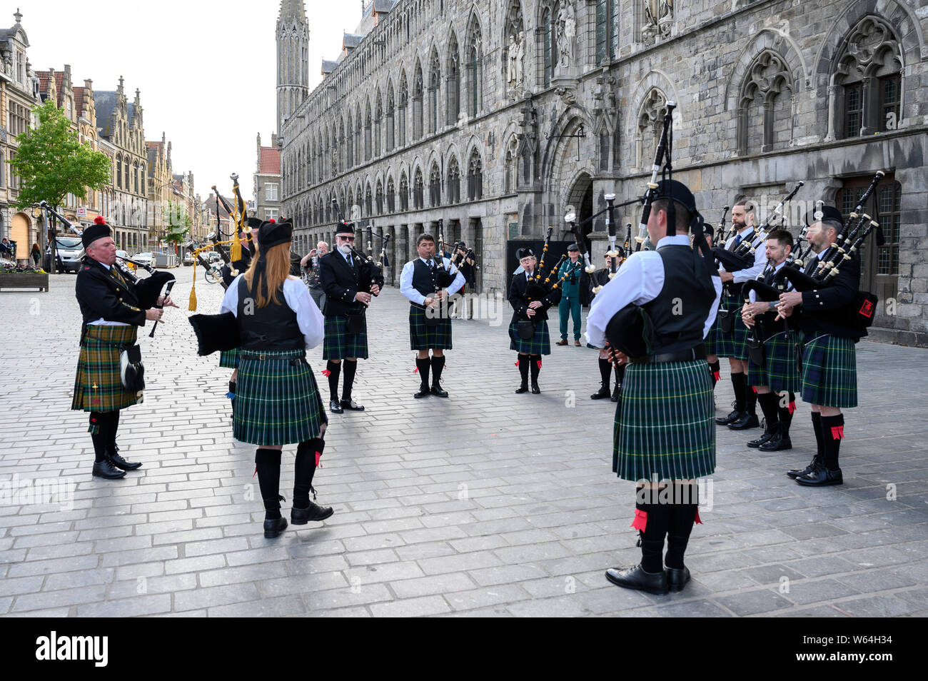 The Sons of Scotland Pipe Band of Ottawa rehearse outside the Cloth Hall, Ypres, Belgium prior to taking part in the Last Post Ceremony Stock Photo