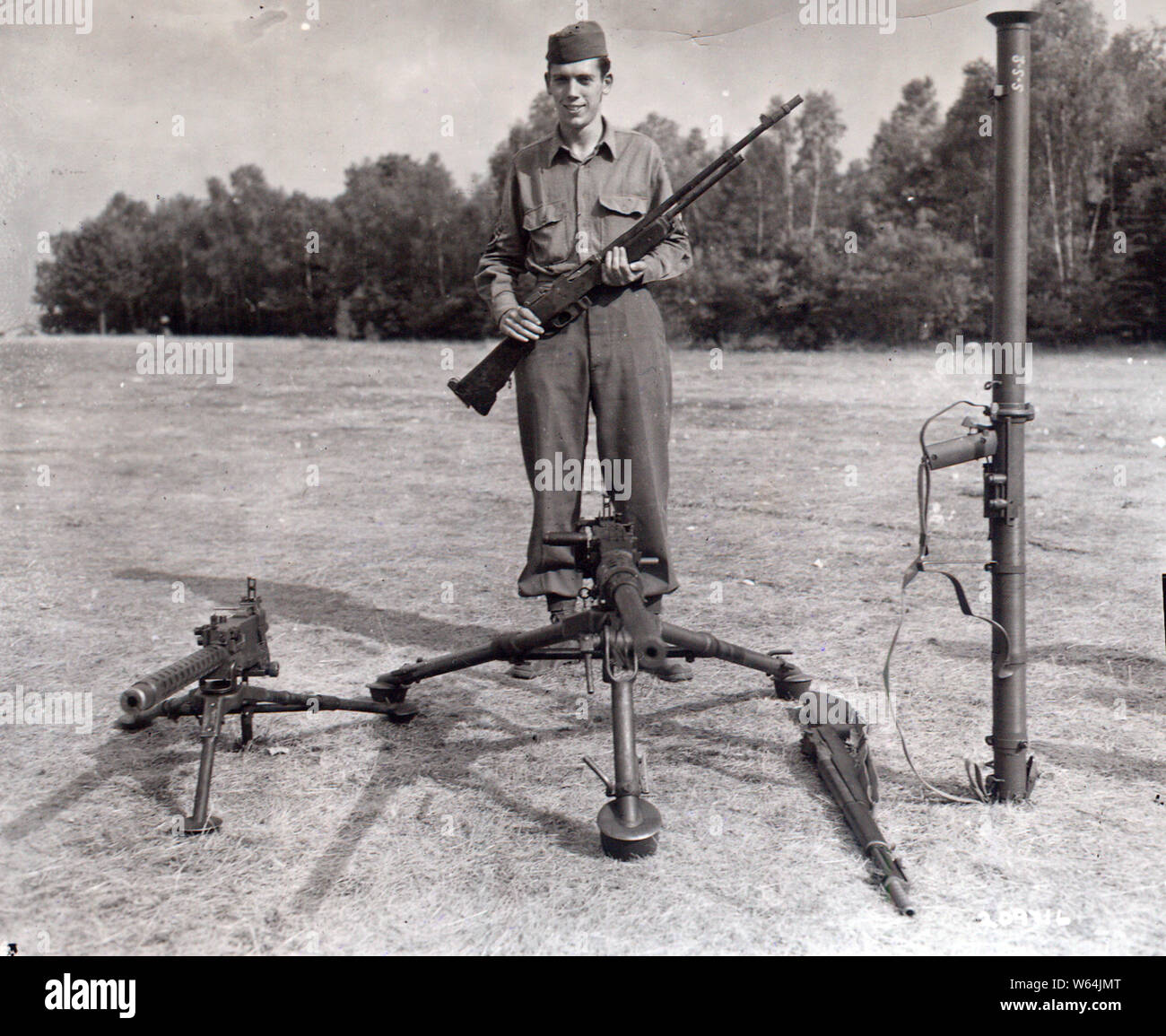 T/Sgt Currey, Francis S., Co. K 120th Infant Regt, 30th Infantry Div. of Hurleysville NY,used these weapons while halting a German attack on his company during the Battle of the Bulge. Maj. Gen. Leland S. Hobbs, CG, 30th infantry division, presented him with the Nation's highest award, the Medal of Honor at Camp Oklahoma City redeployment center near Reims France. Stock Photo