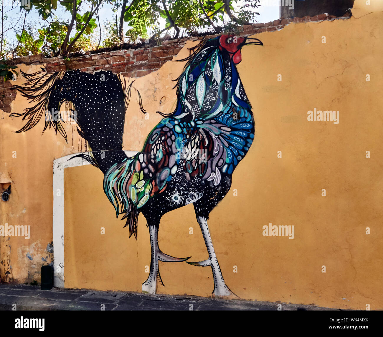 A fresco fowl on a wall in the Xaxanetla district, Puebla de los Angeles, Mexico Stock Photo