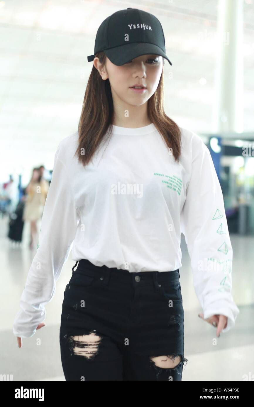 Hong Kong Singer Gloria Tang Tsz Kei Better Known By Her Stage Name G E M Arrives At The Beijing Capital International Airport In Beijing China 2 Stock Photo Alamy