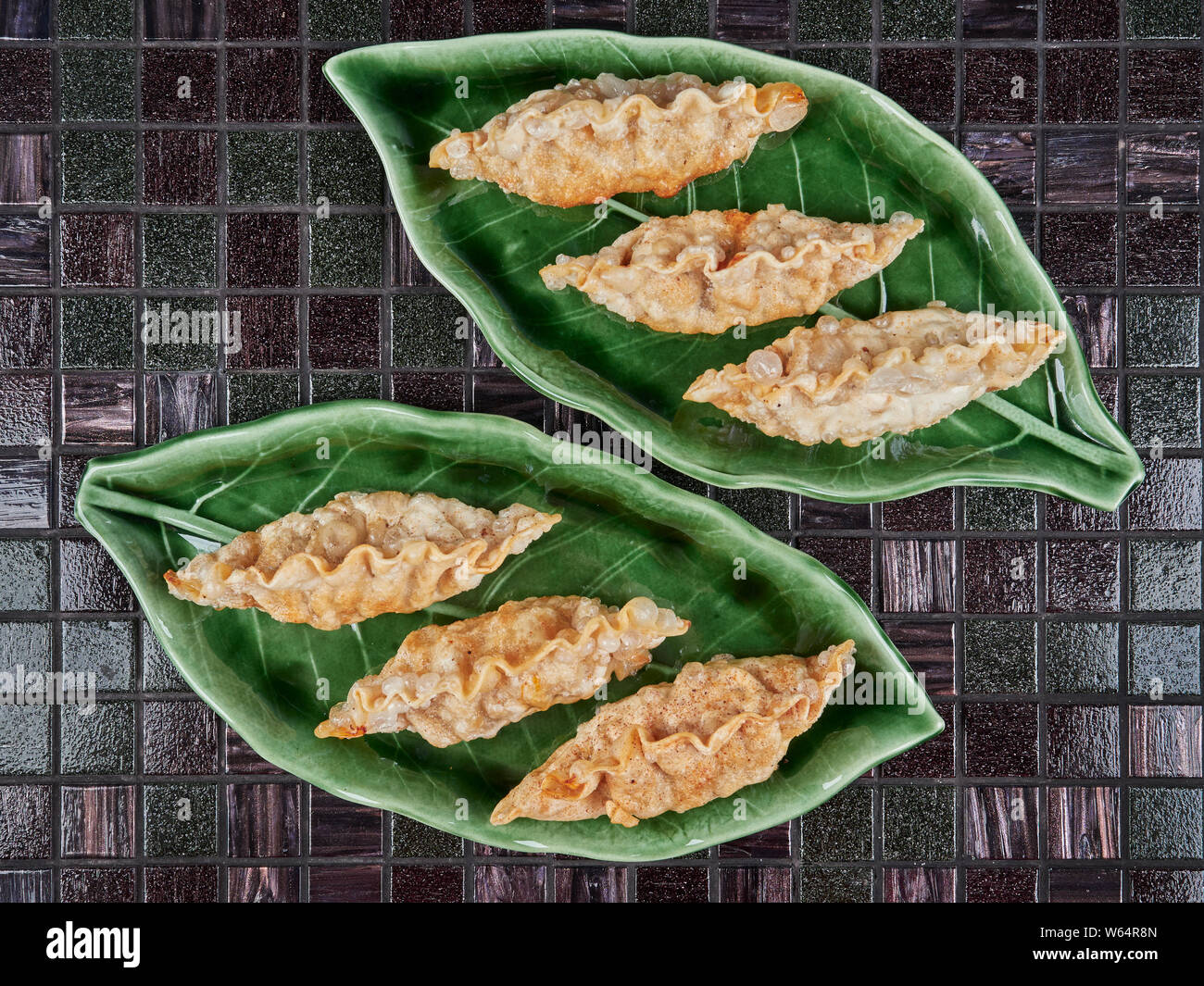 Deep fried Korean dumplings (mandu), filled with beef. Flatlay Stock