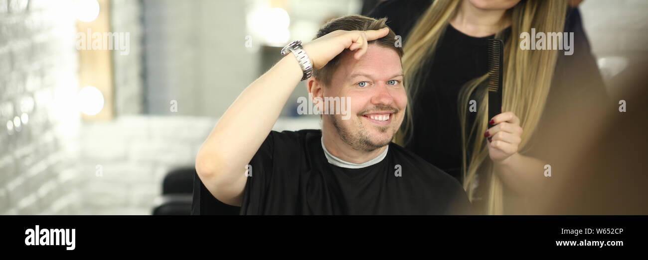 Man Client Showing Haircut Style In Beauty Salon Stock Photo