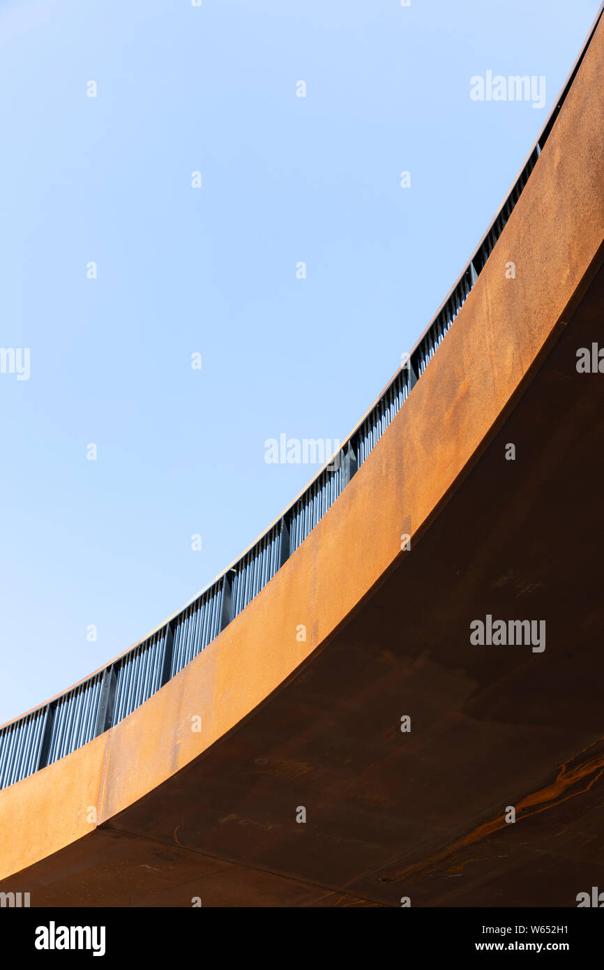 View from below of the elevated corten steel walkway at London Wall Place in the City of London, UK. Stock Photo