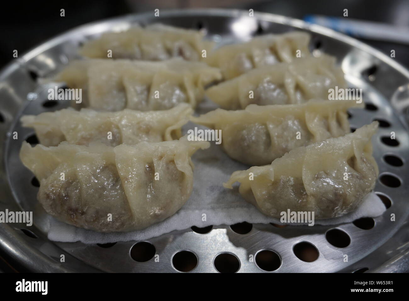 Steamed dumplings with pork mince carrot dice vermicelli rice noodles
