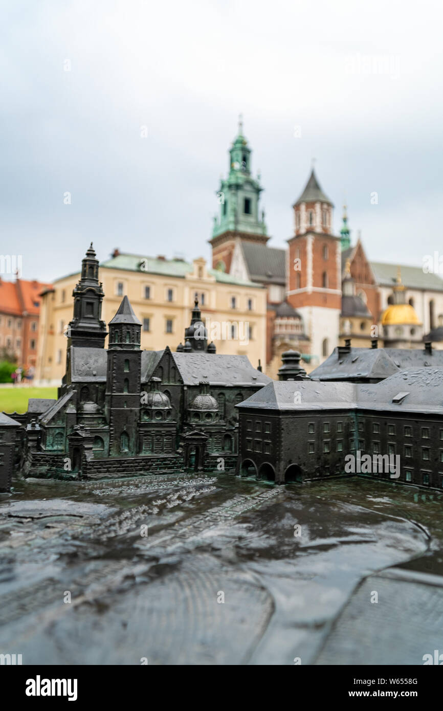 Model of Wawel complex with real buildings in background Stock Photo