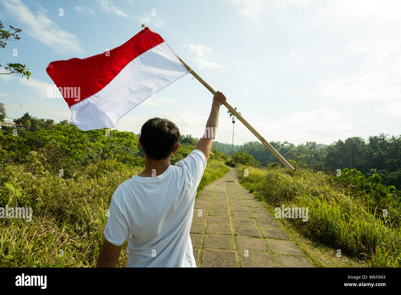 man with indonesian flag of indonesia Stock Photo - Alamy