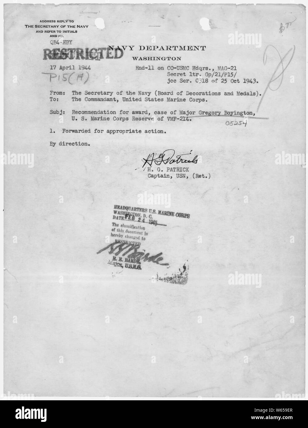Final approval for the award of the Medal of Honor from Captain H.G. Patrick, Navy Board of Decorations and Awards, to the Commandant of the Marine Corps. Subsequently regraded to RESTRICTED on February 25, 1945.; General notes:  Original signatures. Stock Photo