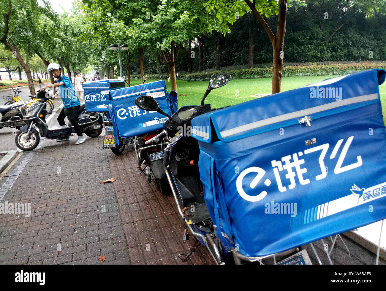 FILEScooters of Chinese meal delivery company Ele.me are parked on