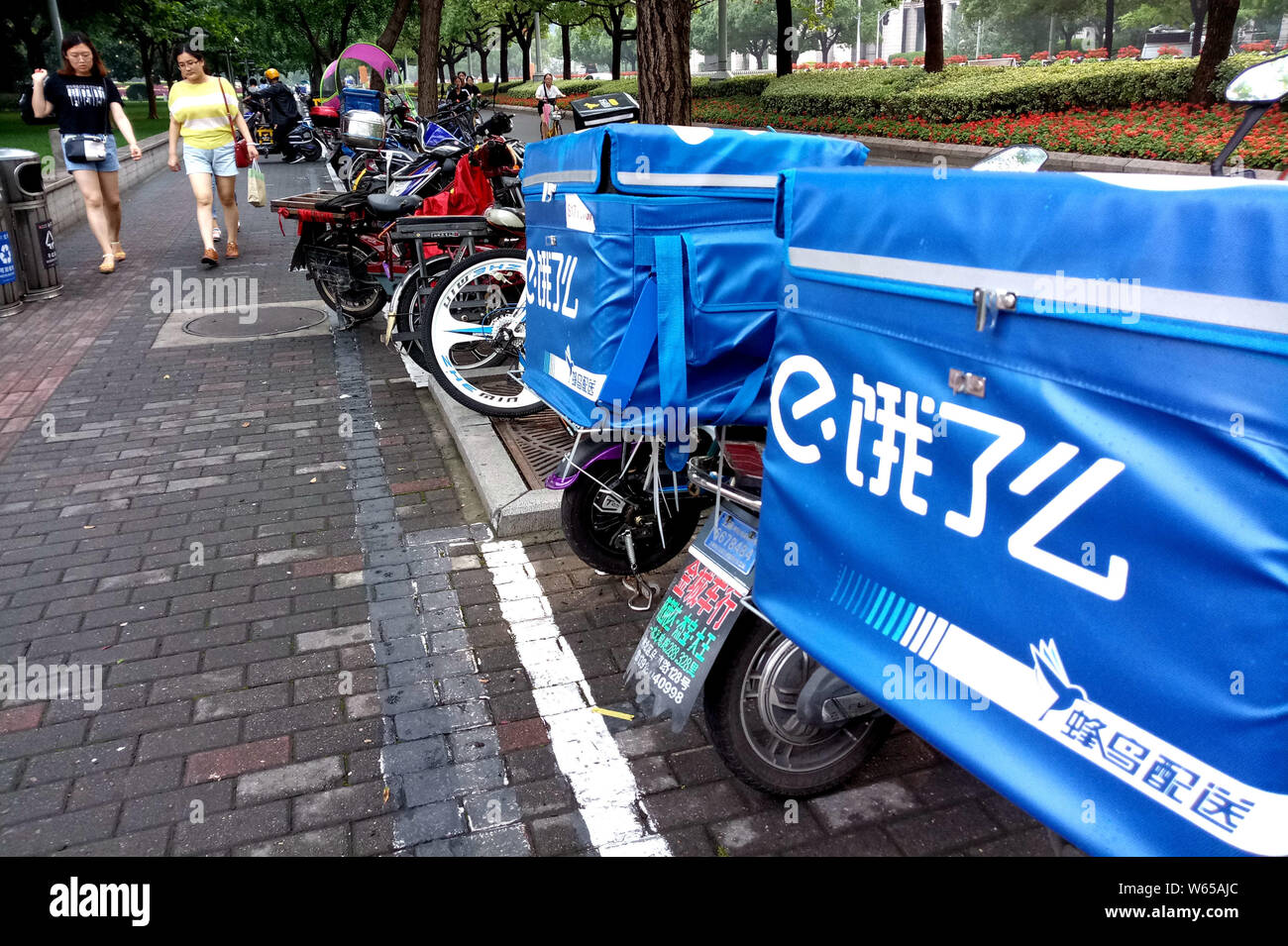 FILEScooters of Chinese meal delivery company Ele.me are parked on