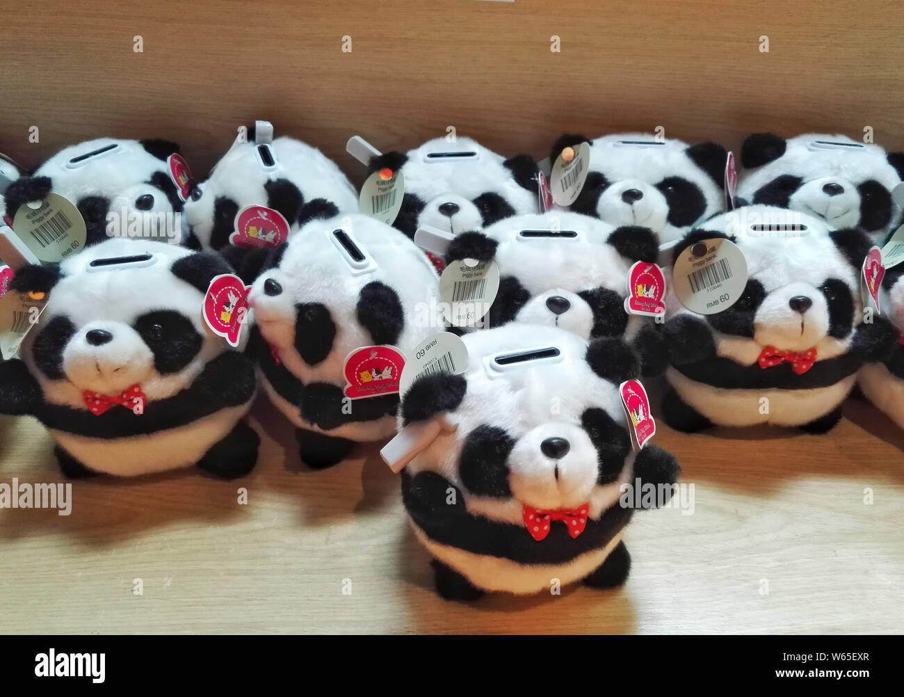 Panda. Shop Panda-themed souvenirs are for sale at the Giant Panda House Shop in ...