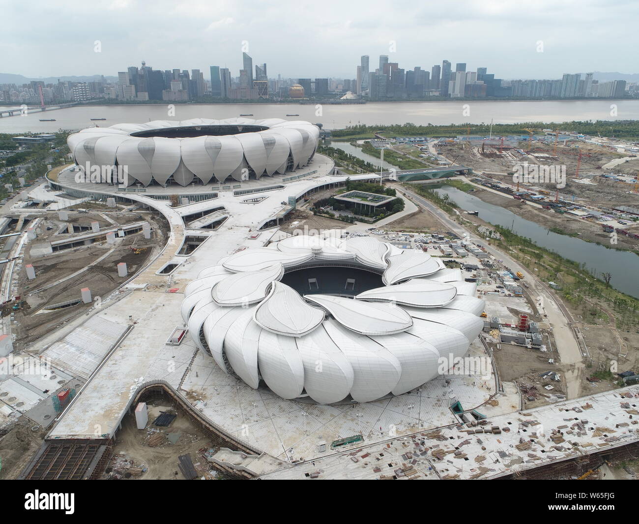 An aerial view of the main stadium, back, and the tennis center of the  Hangzhou Olympic Sports Center, resembling blooming lotus flowers with  dozens o Stock Photo - Alamy