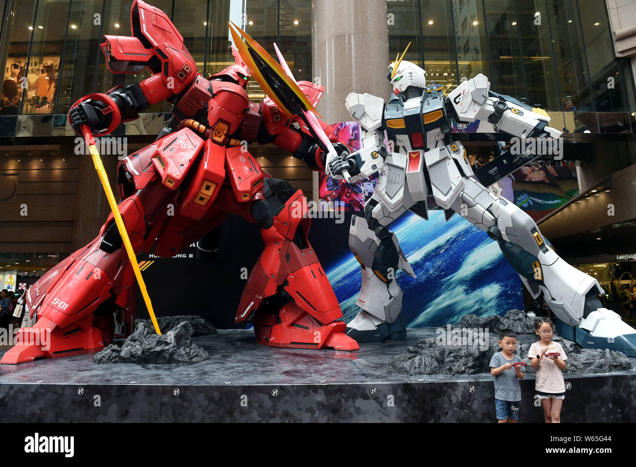 The 6metertall statues of Nu Gundam and Sazabi are on display during