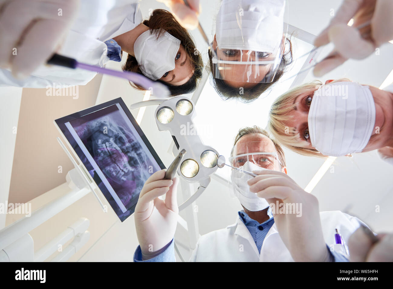 Medical team in the dental clinic of maxillofacial surgery in