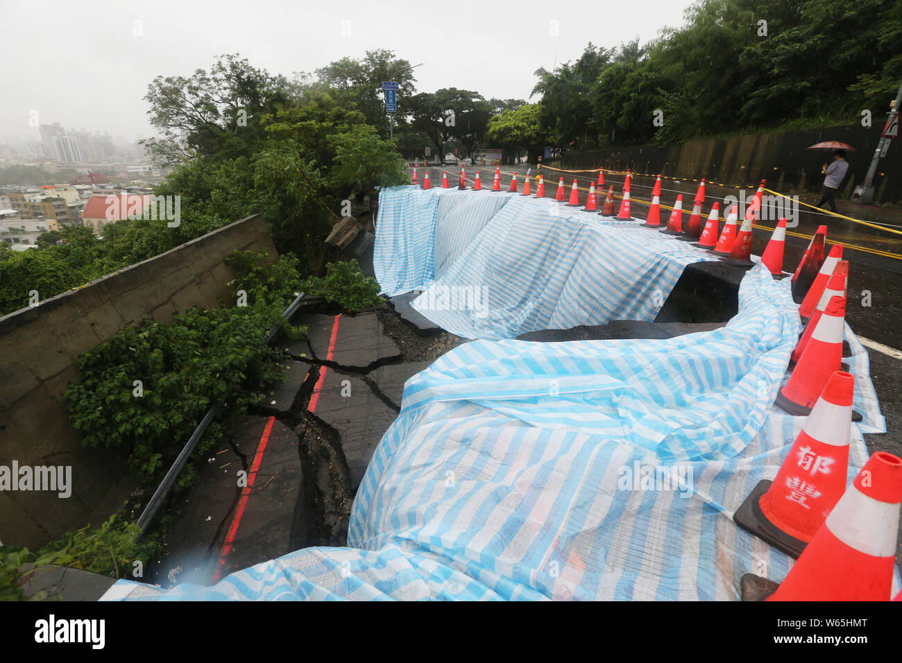 **TAIWAN OUT**View of a road collapse due to torrential rains in a ...