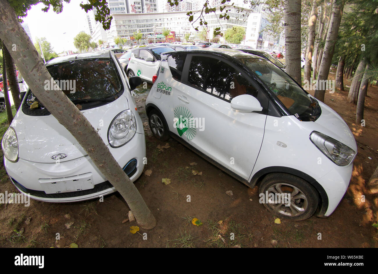 Broken and abandoned electric vehicle (EV) of Chinese carsharing