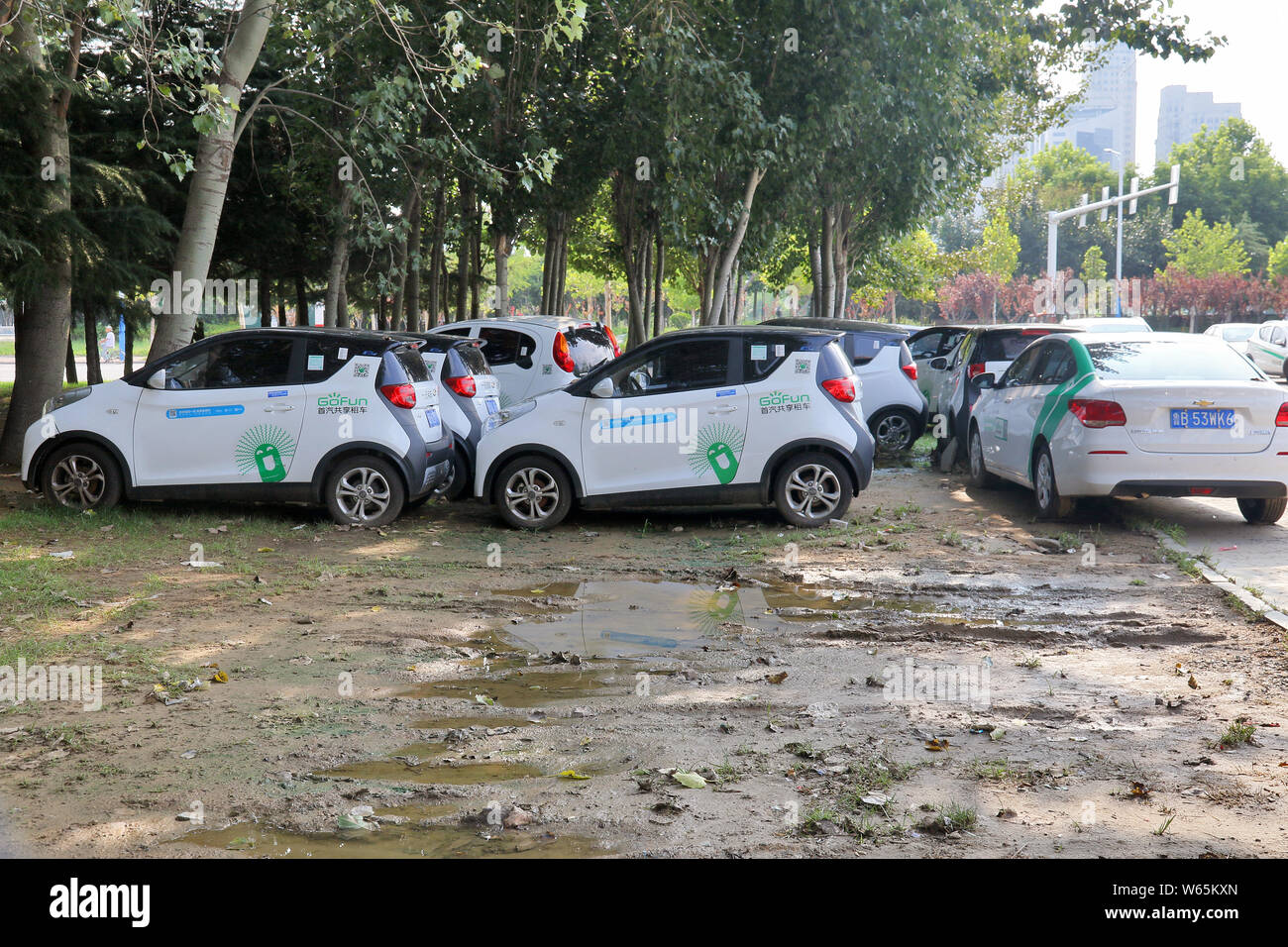 Broken and abandoned electric vehicle (EV) of Chinese carsharing