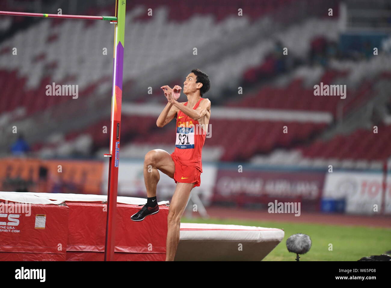 Wang Yu of China competes in the men's high jump final of athletics