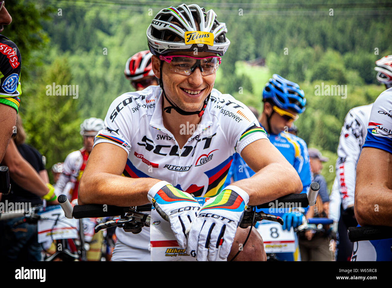 JULY 25, 2010 - CHAMPERY, SWITZERLAND. Nino Schurter at the UCI Mountain Bike Cross Country World Cup. Stock Photo