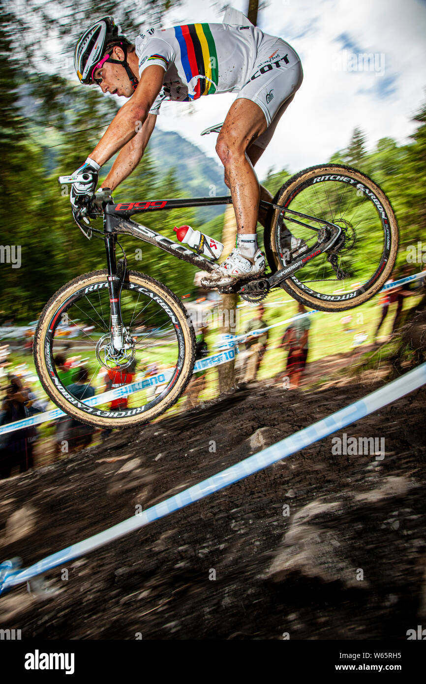 JULY 25, 2010 - CHAMPERY, SWITZERLAND. Nino Schurter at the UCI Mountain Bike Cross Country World Cup. Stock Photo