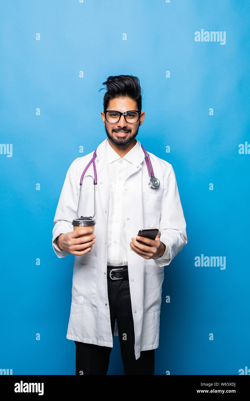 Indian male doctor using mobile hi-res stock photography and images - Alamy