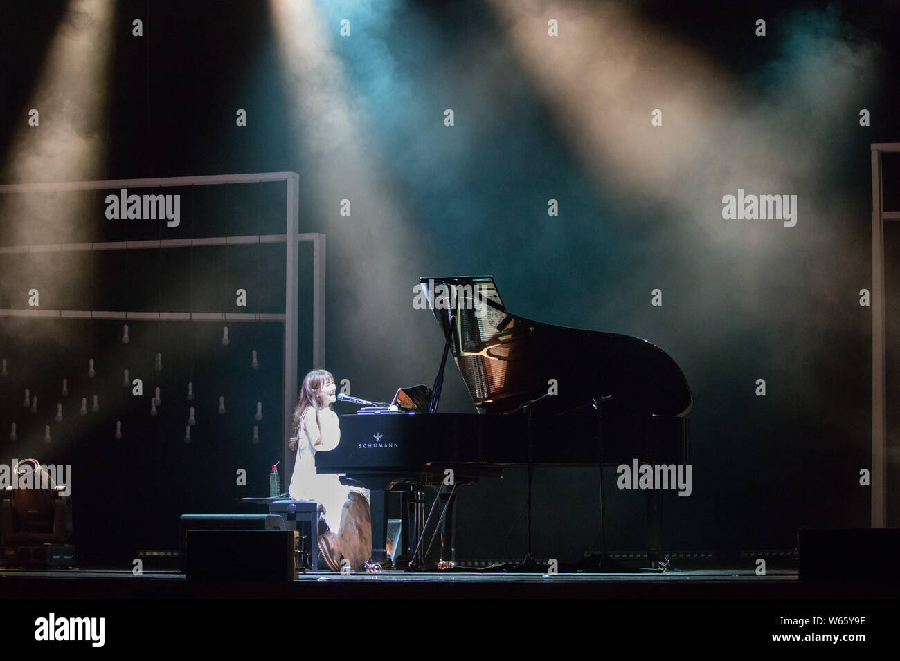 Japanese singer Ai Otsuka performs during a concert in Guangzhou city, south China's Guangdong province, 19 August 2018. Stock Photo