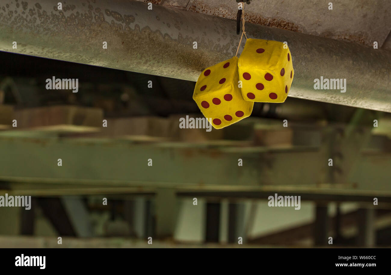 Fluffy Dice hanging from the steel girders under Auckland Harbour Bridge Stock Photo