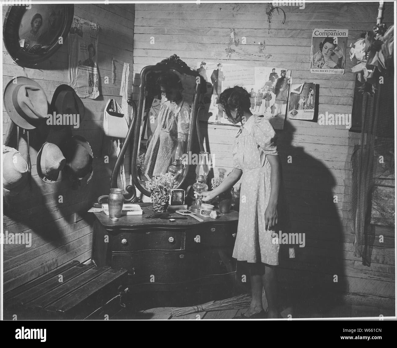 Harmony Community, Putnam County, Georgia. These pictures show the interior of a young tenant's plac . . .; Scope and content:  Full caption reads as follows: Harmony Community, Putnam County, Georgia. These pictures show the interior of a young tenant's place. Pump organs like this one are surprisingly common. Stock Photo