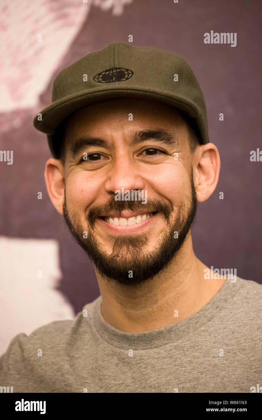 Singer Mike Shinoda of American rock band Linkin Park is pictured before a tour concert in Chengdu city, southwest China's Sichuan province, 16 August Stock Photo