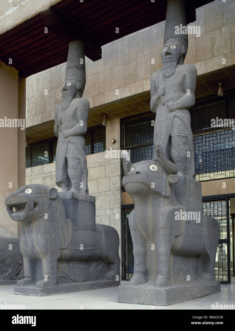 Eastern Mediterranean Civilization. Syria. Halaf Culture (6100-5100 BC). Iron Age Neo-Hittite Settlement of Tell Halaf. Caryatids and sculptures of basalt, which guarded the Tell Halaf Temple, placed at the entrance of the National Museum of Aleppo. (Picture taken before the civil war). Stock Photo