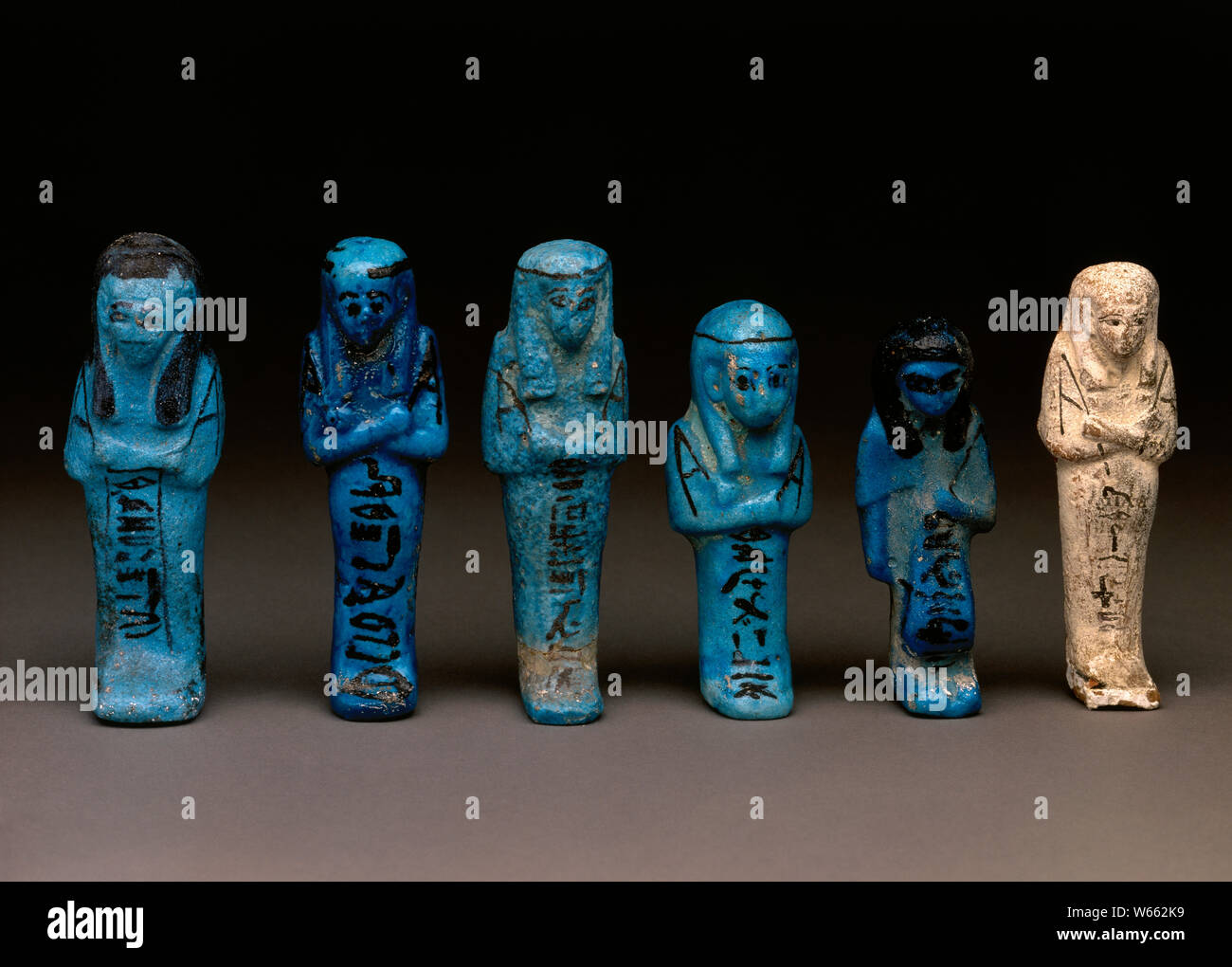 Group of ushabtis. Funerary figurines in the ancient Egypt. National Archaeological Museum. Madrid. Spain. Stock Photo
