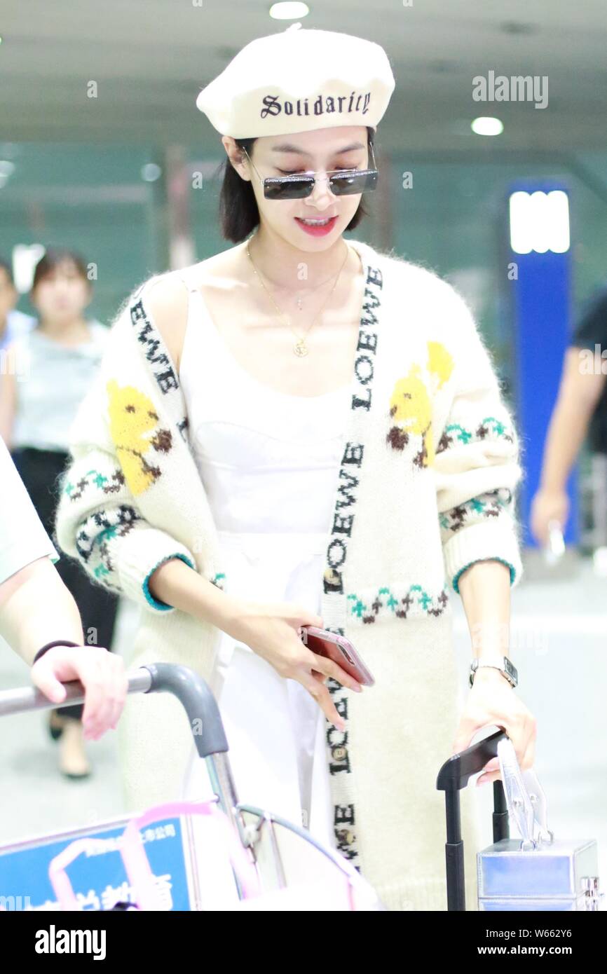 Chinese singer and actress Victoria Song or Song Qian arrives at the Beijing Capital International Airport in Beijing, China, 29 August 2018.   Cardig Stock Photo