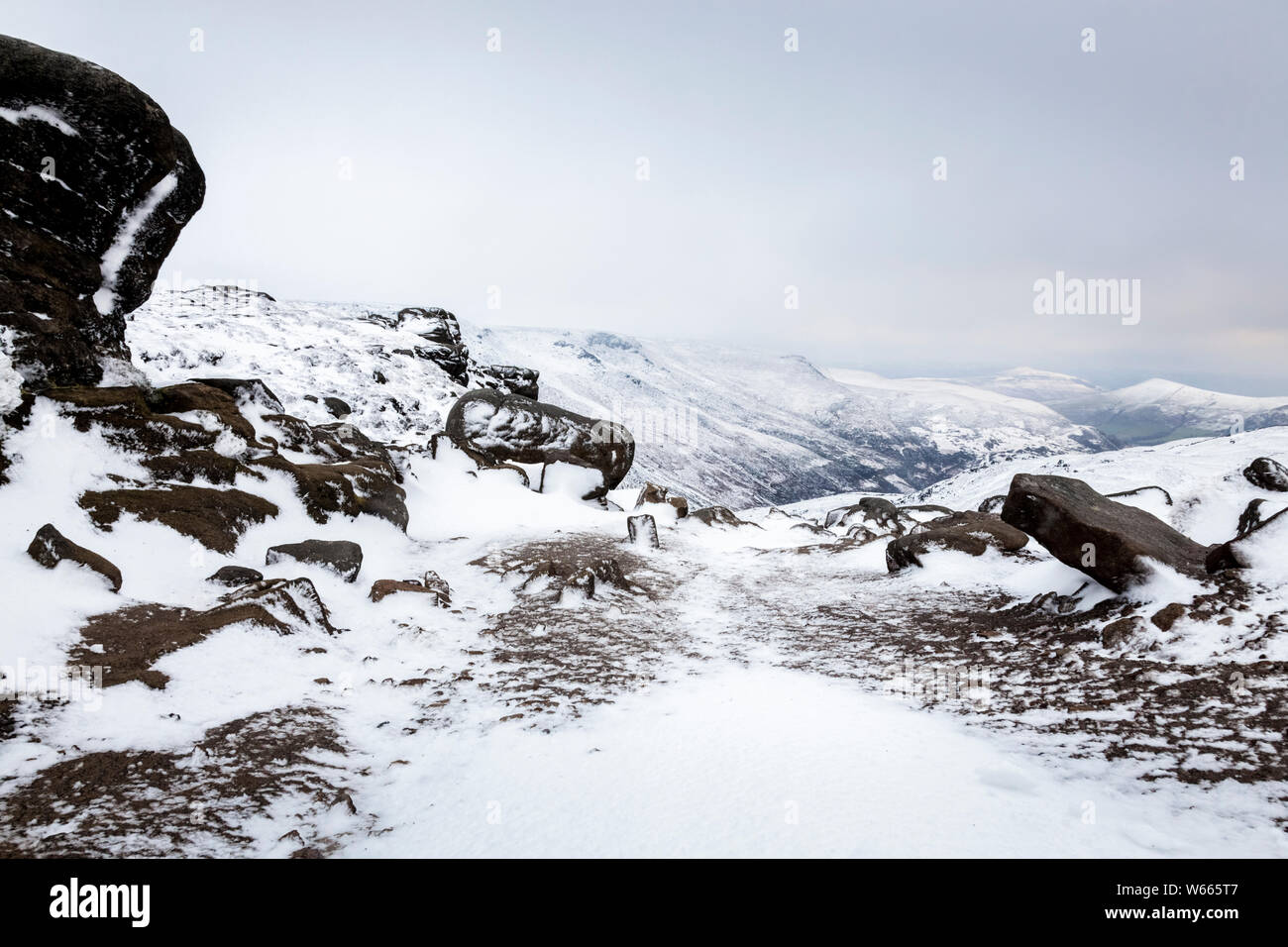 Winter snow on Grindsbrook Clough on the southern edge of Kinder Scout, Derbyshire, Peak District National Park, England, UK Stock Photo