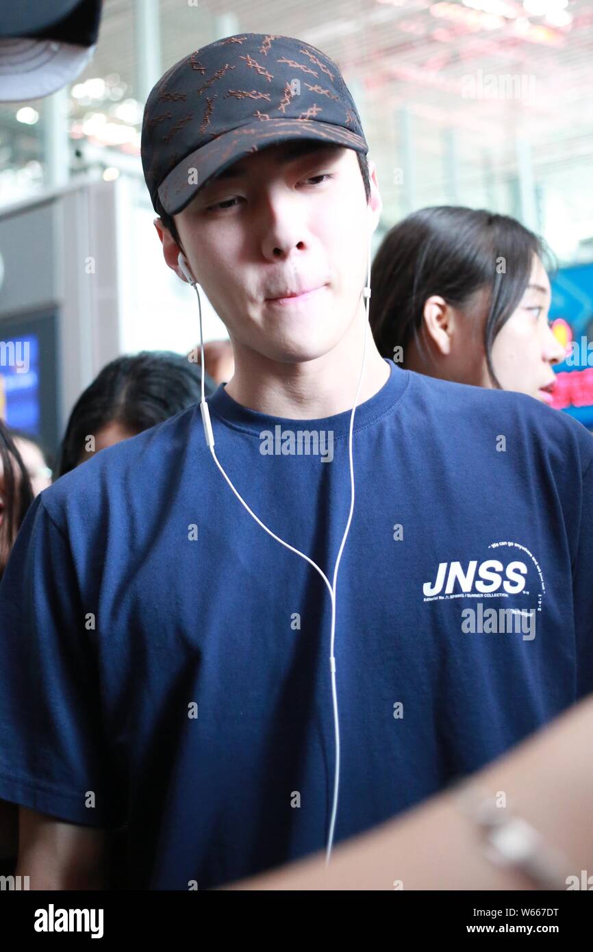 South Korean Singer And Actor Oh Se Hun Better Known Mononymously As Sehun Of South Korean Boy Group Exo Arrives At The Beijing Capital Internationa Stock Photo Alamy