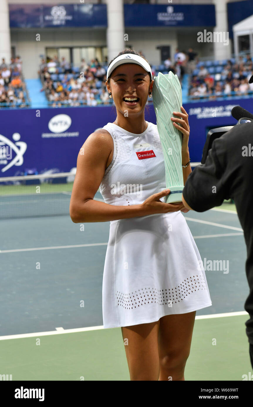 Wang Qiang of China poses with her trophy after defeating Zheng Saisai of  China in their women's final match during the 2018 WTA Jiangxi Open tennis t  Stock Photo - Alamy