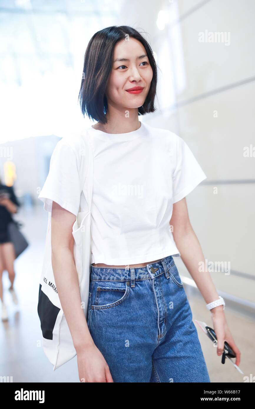 Chinese model Liu Wen is pictured at an airport in Shanghai, China, 19 July 2018. Stock Photo