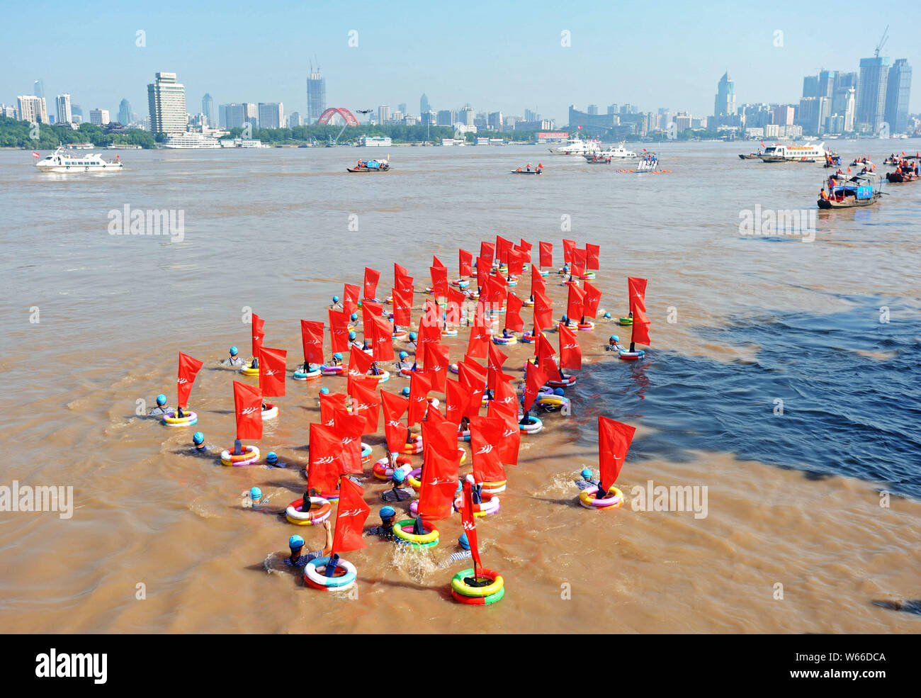 Swimmers Take Part In The 18 Yangtze River Swimming Race To Mark The 51th Anniversary Of Chairman Mao Zedong S Swimming Tour Of The Yangtze River In Stock Photo Alamy