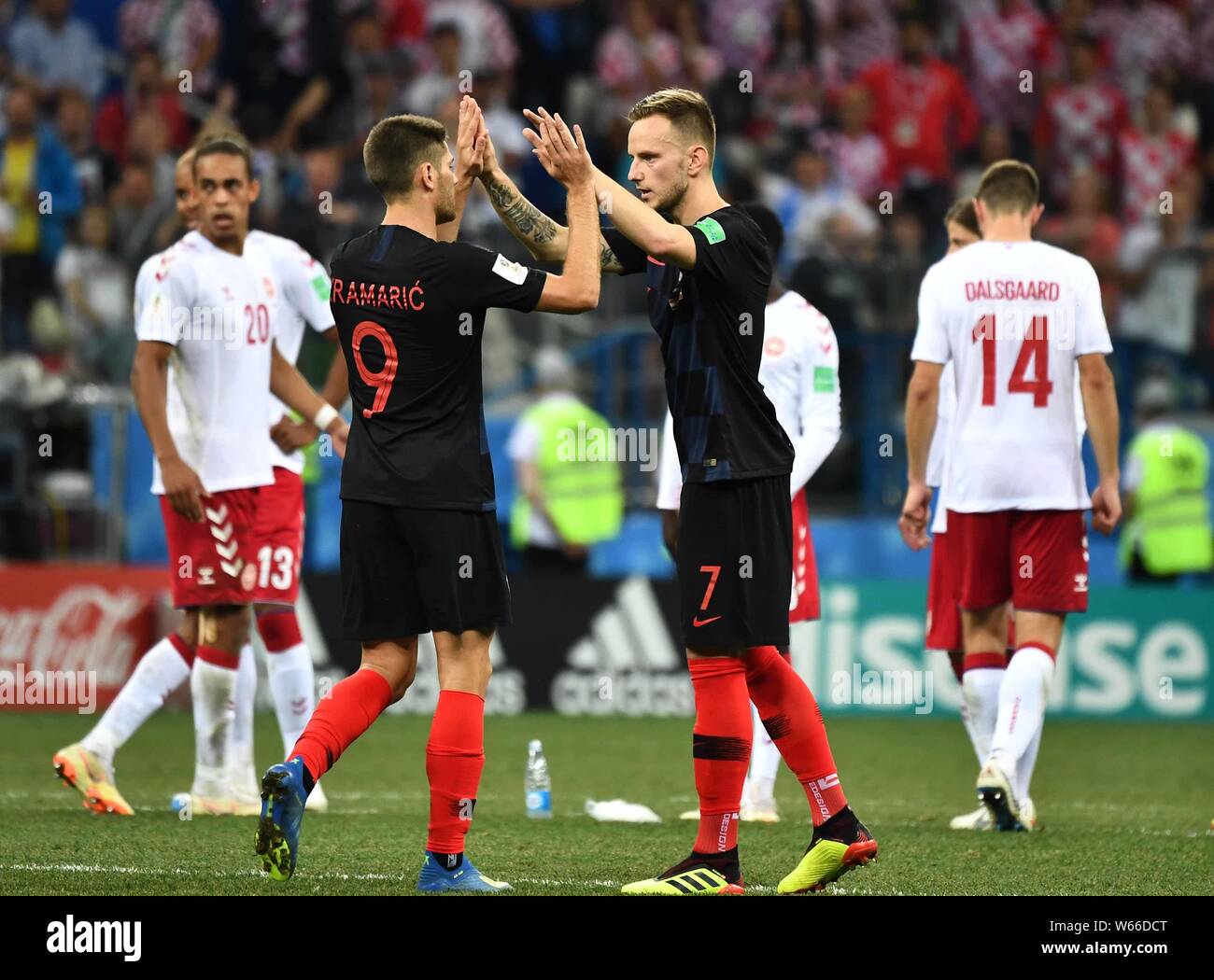 Andrej Kramaric, left, and Ivan Rakitic of Croatia celebrate after scoring a goal by penalty kick against Denmark in the Round of 16 match during the Stock Photo