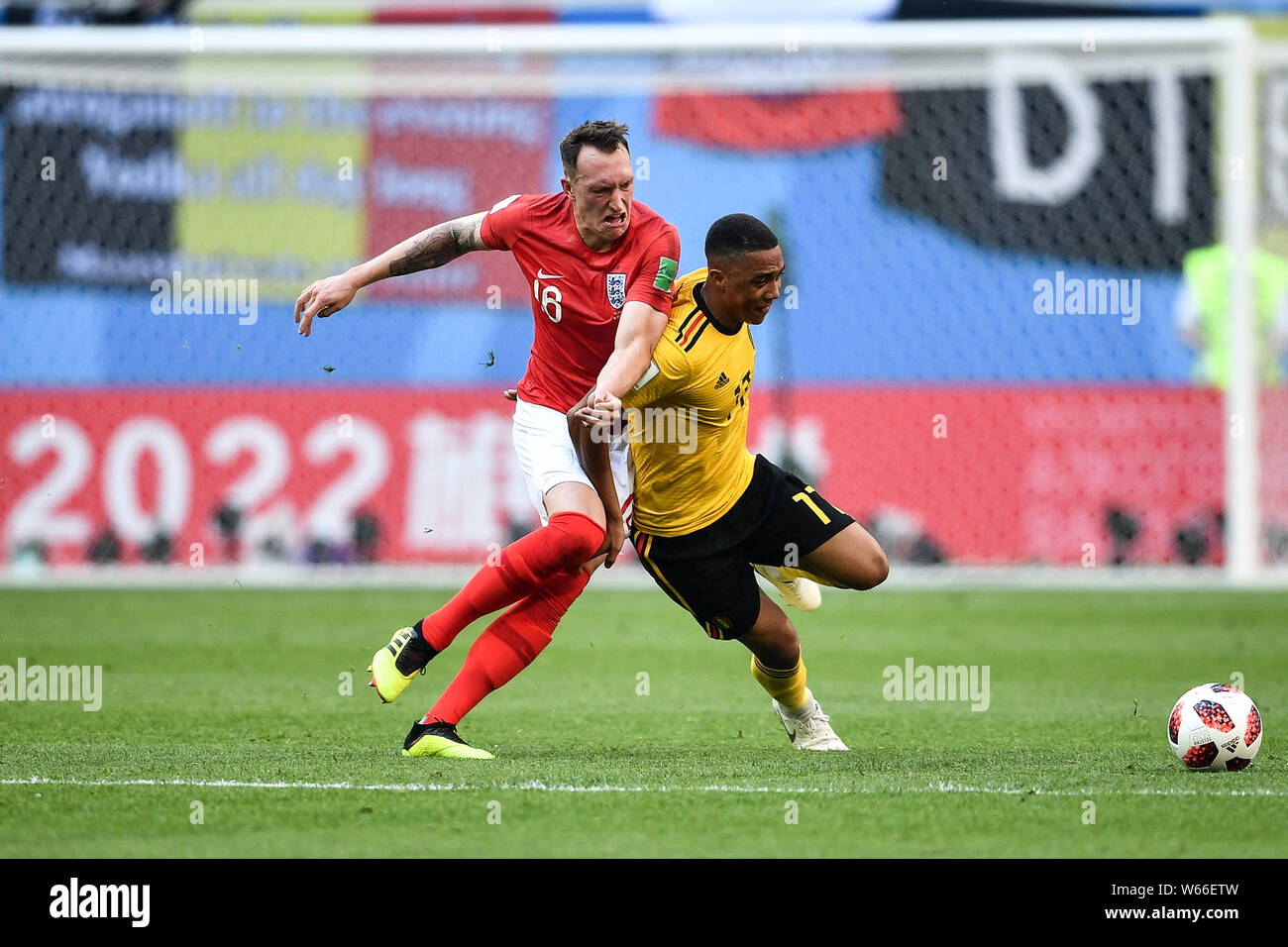 Youri Tielemans of Belgium, right, challenges Phil Jones of England in their third place match during the 2018 FIFA World Cup in Saint Petersburg, Rus Stock Photo