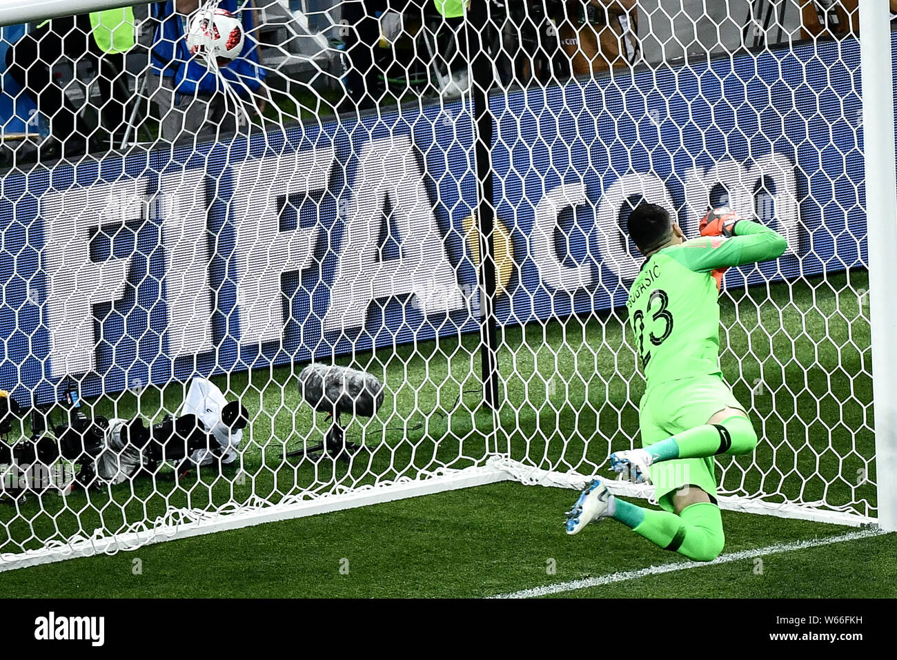 Goalkeeper Danijel Subasic of Croatia fails to save the goal by Kieran Trippier of England in their semifinal match during the 2018 FIFA World Cup in Stock Photo