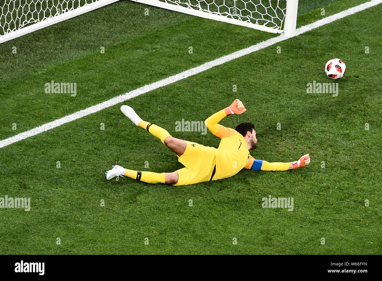 Goalkeeper Hugo Lloris of France tries to save a shot by Belgium in their semifinal match during the 2018 FIFA World Cup in Saint Petersburg, Russia, Stock Photo