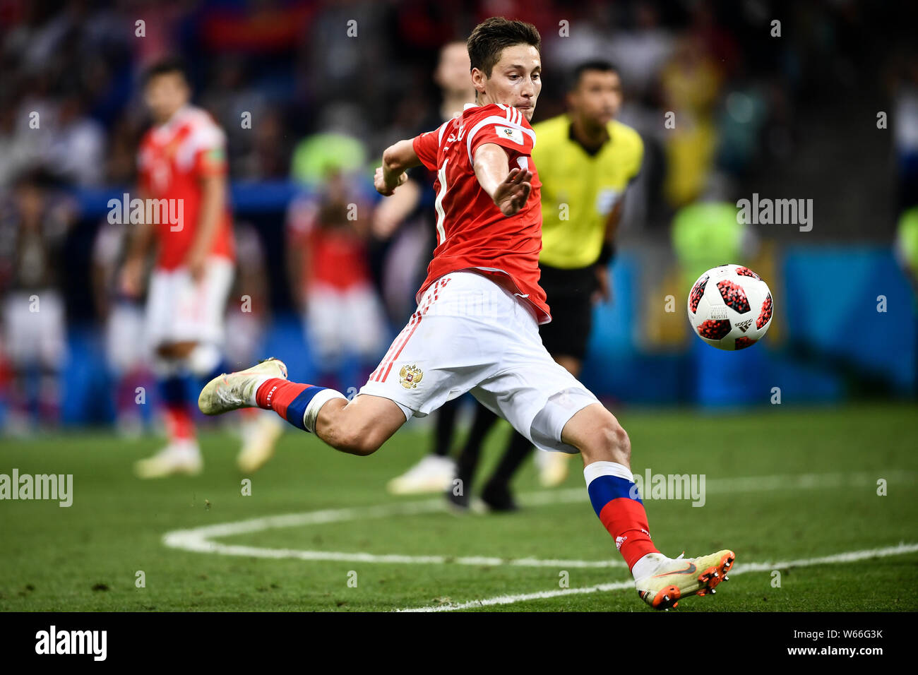 Daler Kuzyayev of Russia kicks the ball to shoot against Croatia in the quarterfinal match during the 2018 FIFA World Cup in Sochi, Russia, 7 July 201 Stock Photo