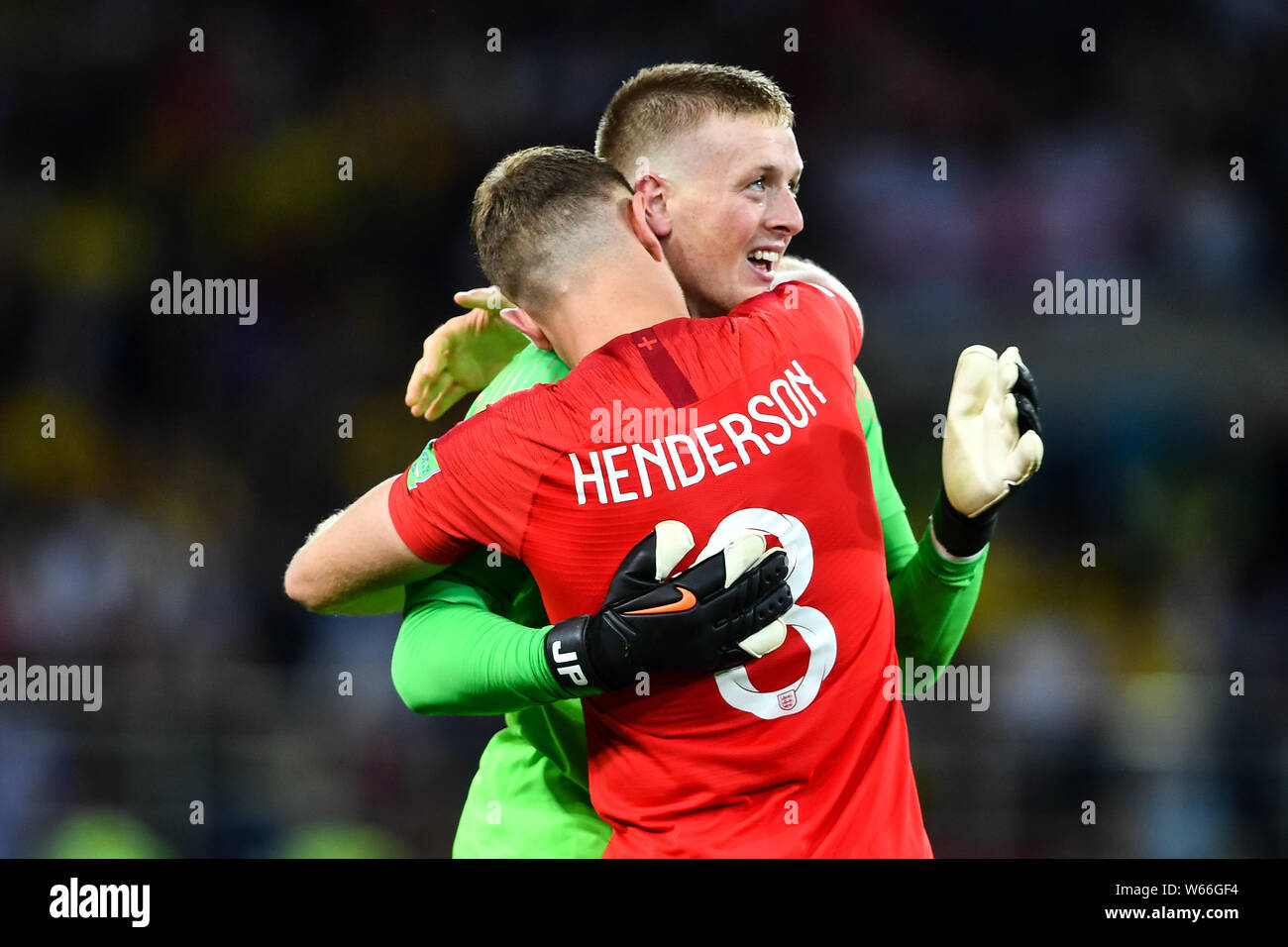 Jordan Henderson and Jordan Pickford of England celebrate after defeating Columbia in their Round of 16 match during the 2018 FIFA World Cup in Moscow Stock Photo