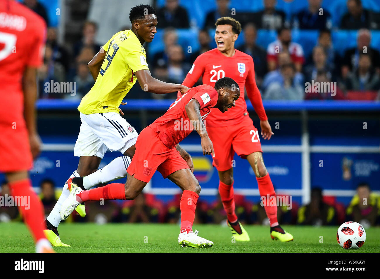 Yerry Mina of Columbia, left, challenges Raheem Sterling of England in their Round of 16 match during the 2018 FIFA World Cup in Moscow, Russia, 3 Jul Stock Photo