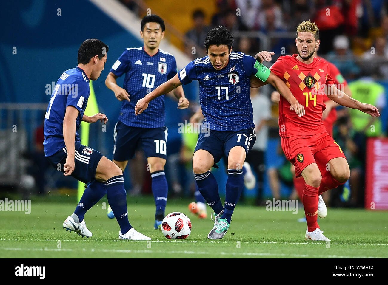 Dries Mertens of Belgium, right, challenges Makoto Hasebe of Japan in their Round of 16 match during the 2018 FIFA World Cup in Rostov, Russia, 2 July Stock Photo
