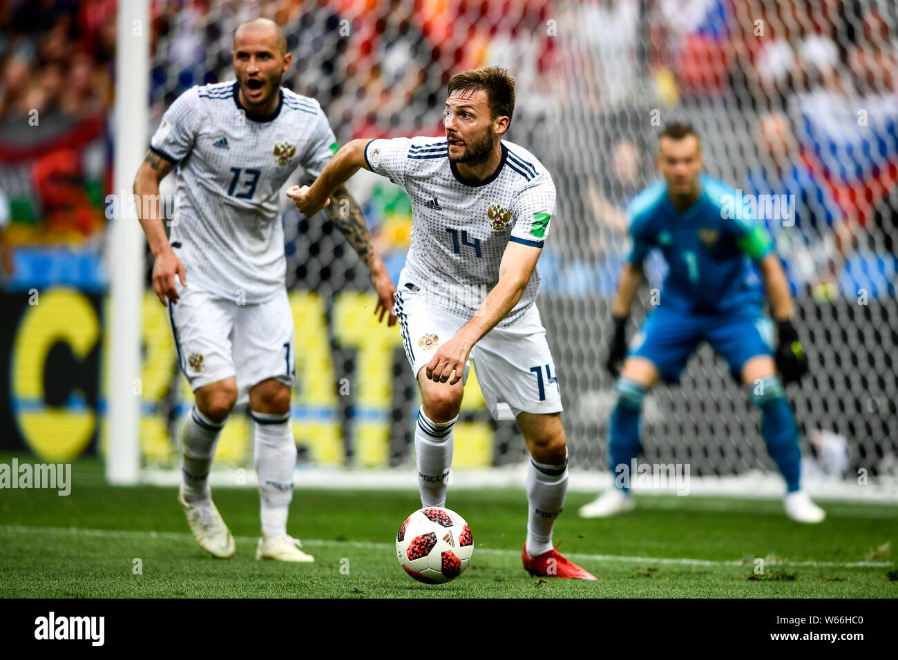 Vladimir Granat of Russia, right, competes against Spain in their Round of 16 match during the 2018 FIFA World Cup in Moscow, Russia, 1 July 2018.   R Stock Photo